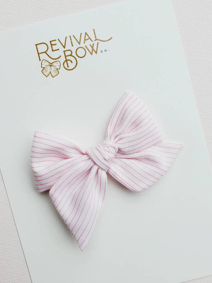 Small Pinwheel Bow on Clip • Pink Stripe for wholesale by Revival Bow Co.