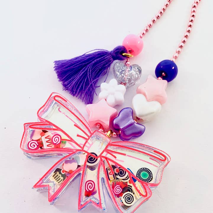 Handmade Bow Shaker Charm Ball Chain Necklace for wholesale by Sadie’s Moon