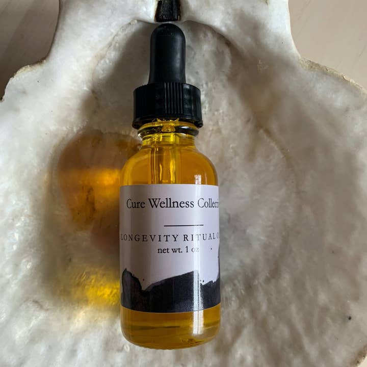 HUILE DE LONGÉVITÉ | Huile rituelle pour le visage pour la vente par Cūre Wellness Collective