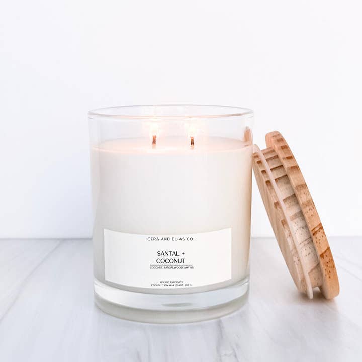 Santal + Noix de coco| Bougie à la noix de coco 10 oz. Bougie en verre transparent pour la vente par Ezra and Elias Co.