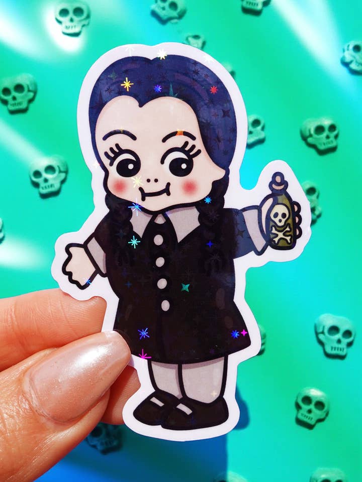 Wednesday Sticker – Creepy Cute Gothic Glitter Vinyl Sticker for wholesale by Untamedego LLC