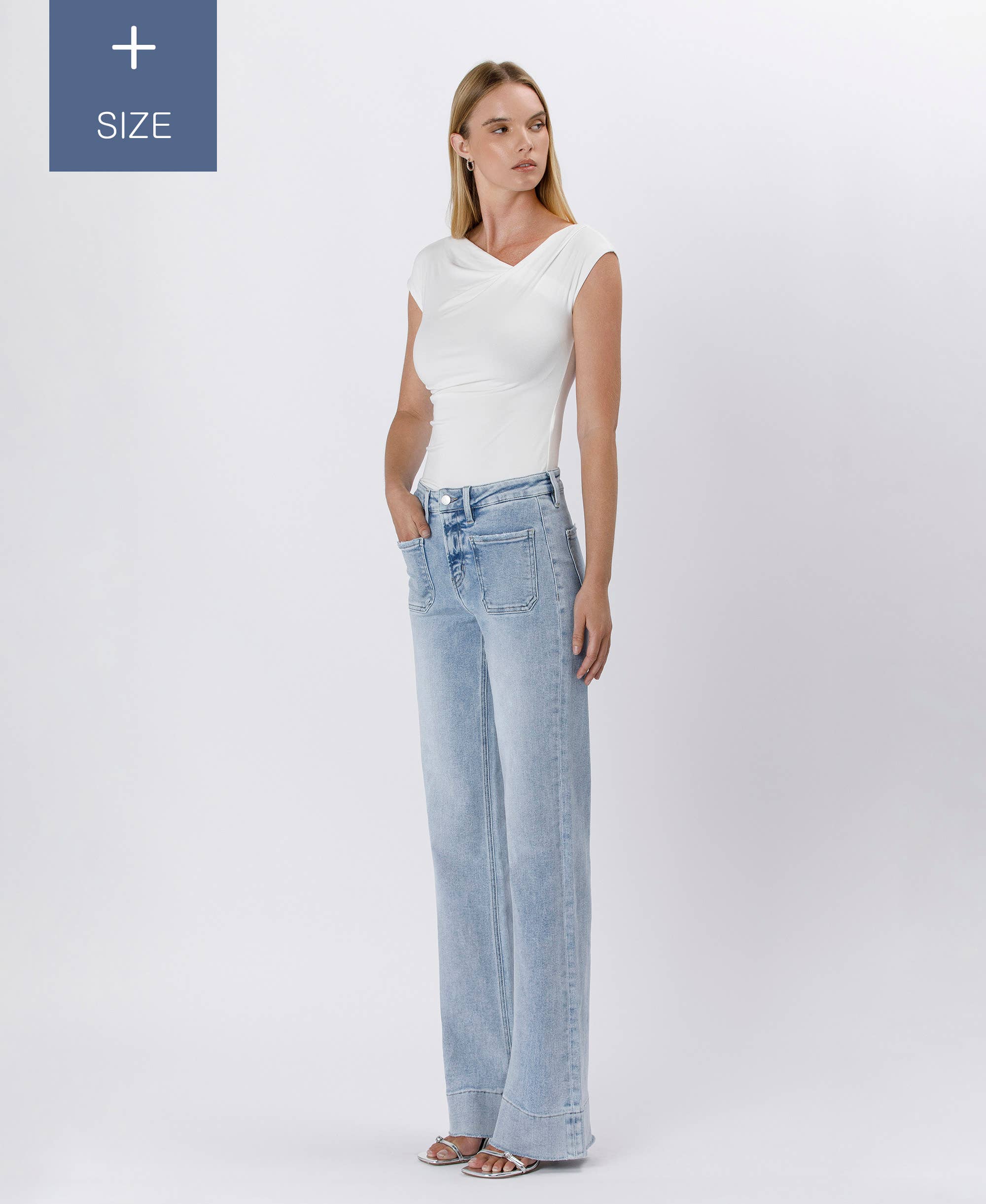 TENTAR JEANS ACAMPANADOS CON DOBLADILLO DE PANTALÓN DE TALLE ALTO DE TALLA GRANDE LV1602-P de venta al por mayor en Faire8