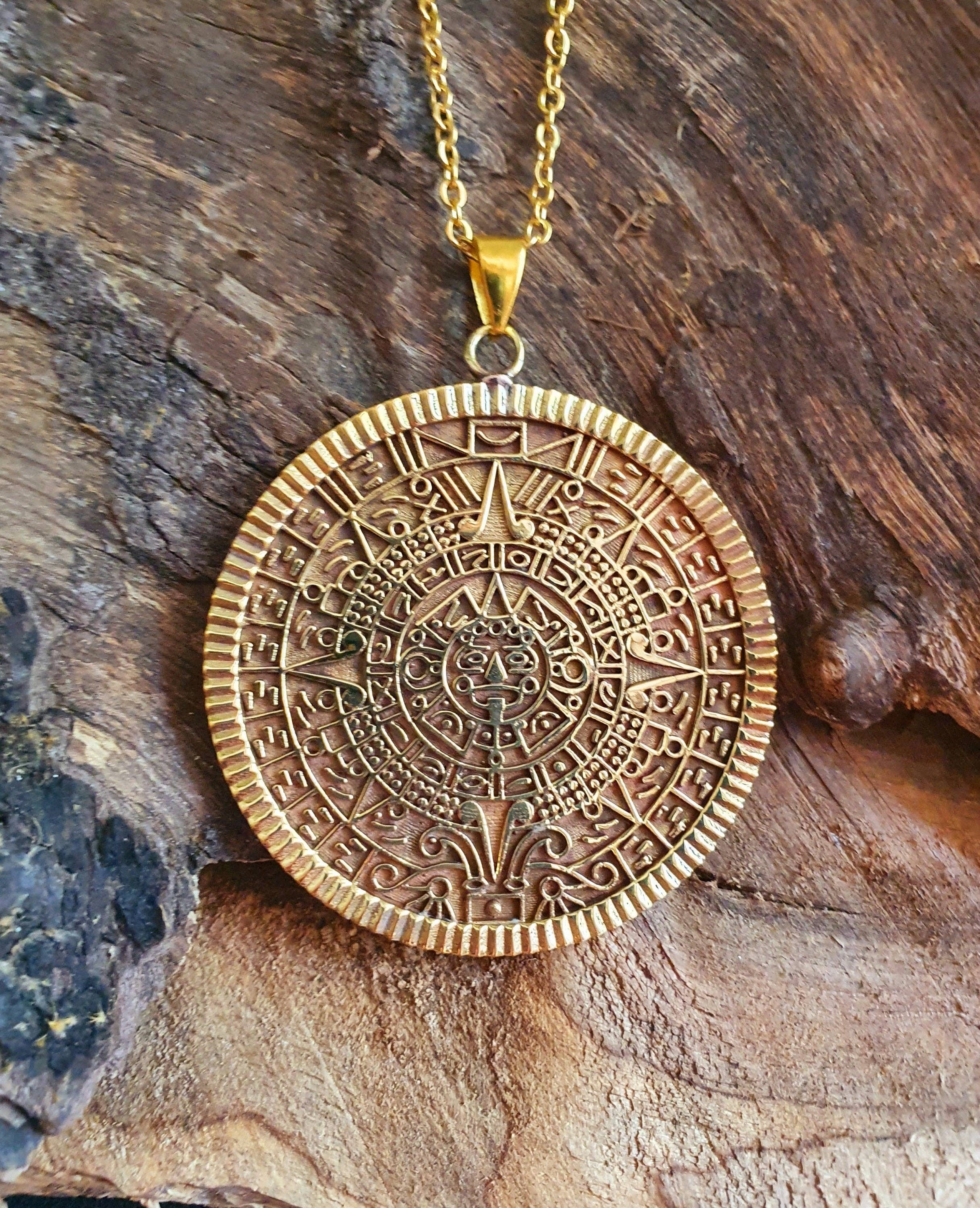 Kaali Boutique – wholesale Pendant/charm necklace – Gold Sacred Mayan Calendar Necklace / Hypoallergenic / Brass / Boho / Aztec / Inca / Ethnic / Hypoallergenic / Third Eye / Illuminati1