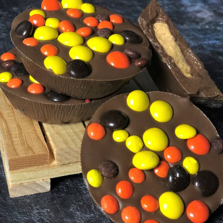 Chocolate Pizza Company Inc - Wholesale Chocolate Covered Sweets - Decorated Peanut Butter Cup