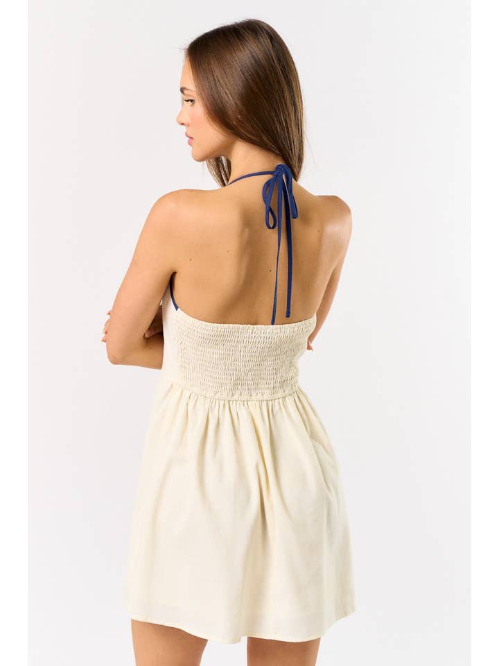 OFF WHITE NAVY IBD33506 LINEN SEASHELL EMBROIDERY HALTER MINI DRESS for wholesale on Faire