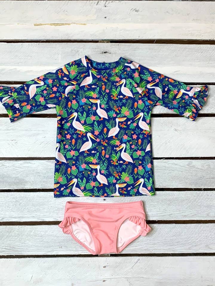 Pelicans in Paradise Ruffle Half Sleeve Sun Shirt and Ruffle Swim Bottom Set for wholesale by Tidewater Tots