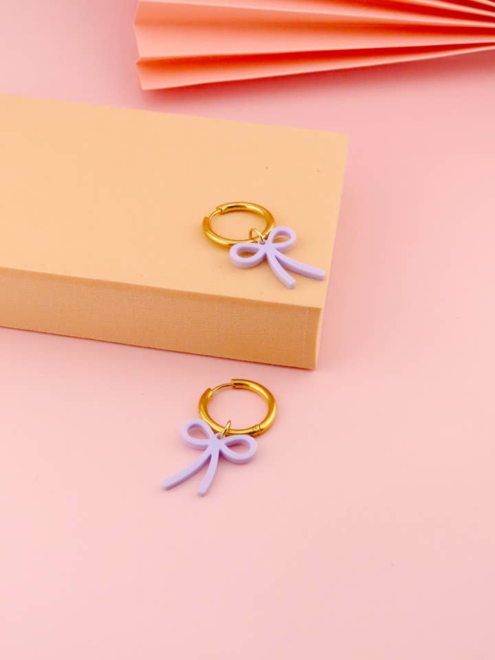 Lilac Bow Hoop Earrings for wholesale by Niemalsmehrohne
