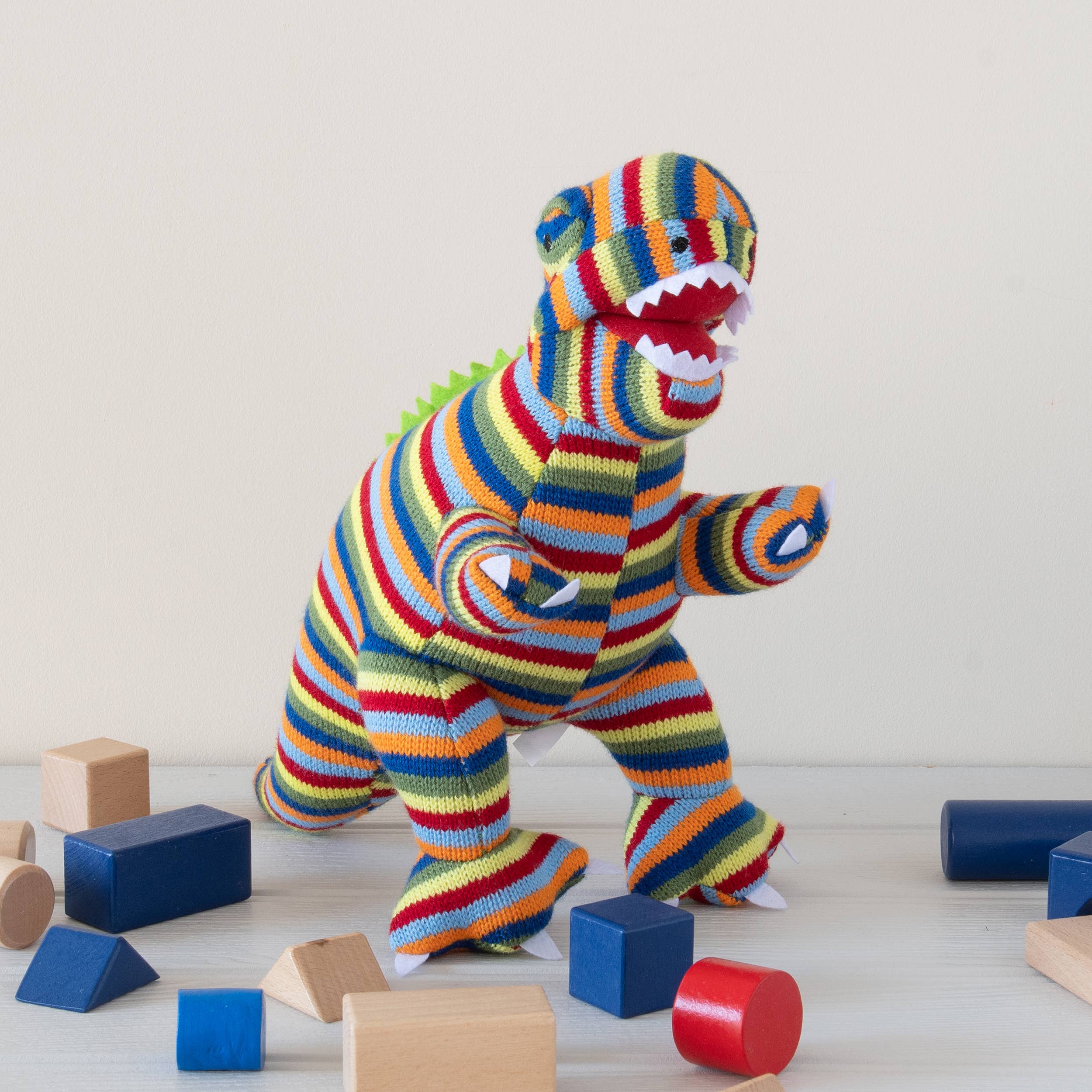 Best Years Ltd - Wholesale Stuffed/Plush Toy - Kids & Baby - T Rex Soft Toy Dinosaur Teddy - Knitted Rainbow Stripe