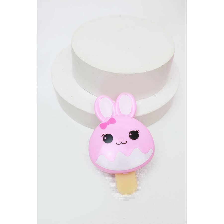 MÉLANGER LA COULEUR Brillant à lèvres Bunny Popsicle en vente sur Faire0