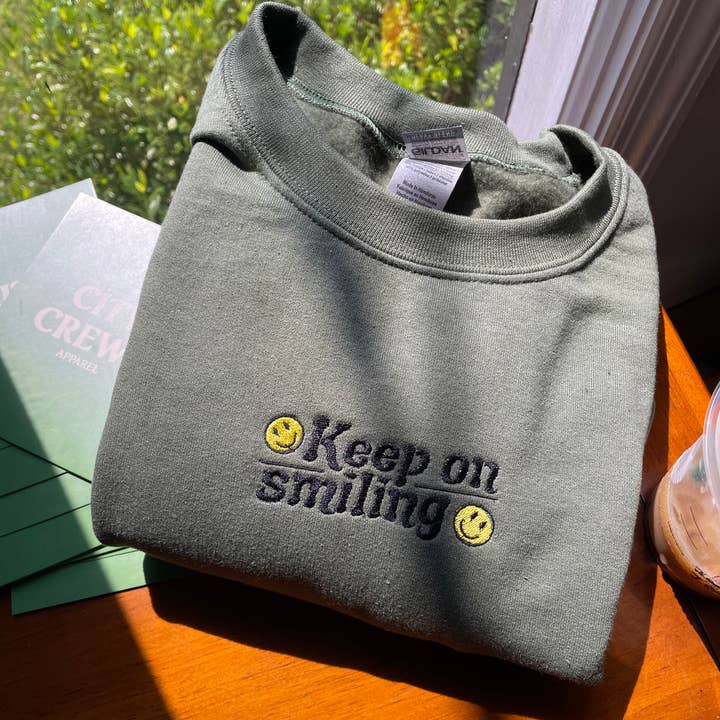 Keep On Smiling Sweatshirt for wholesale by City Crews Apparel