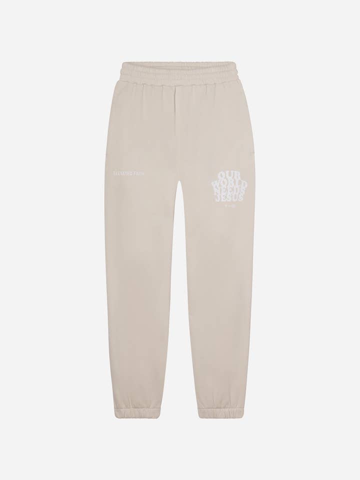 Pantalón de chándal unisex beige Our World Needs Jesus para venta al por mayor de Elevated Faith