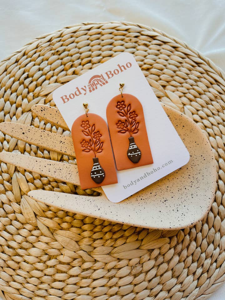 The Terracotta Painted Vase Earrings for wholesale by Body & Boho