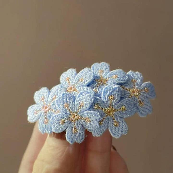 BLUE Irregular Fabric Flower Hair Clip for wholesale on Faire1
