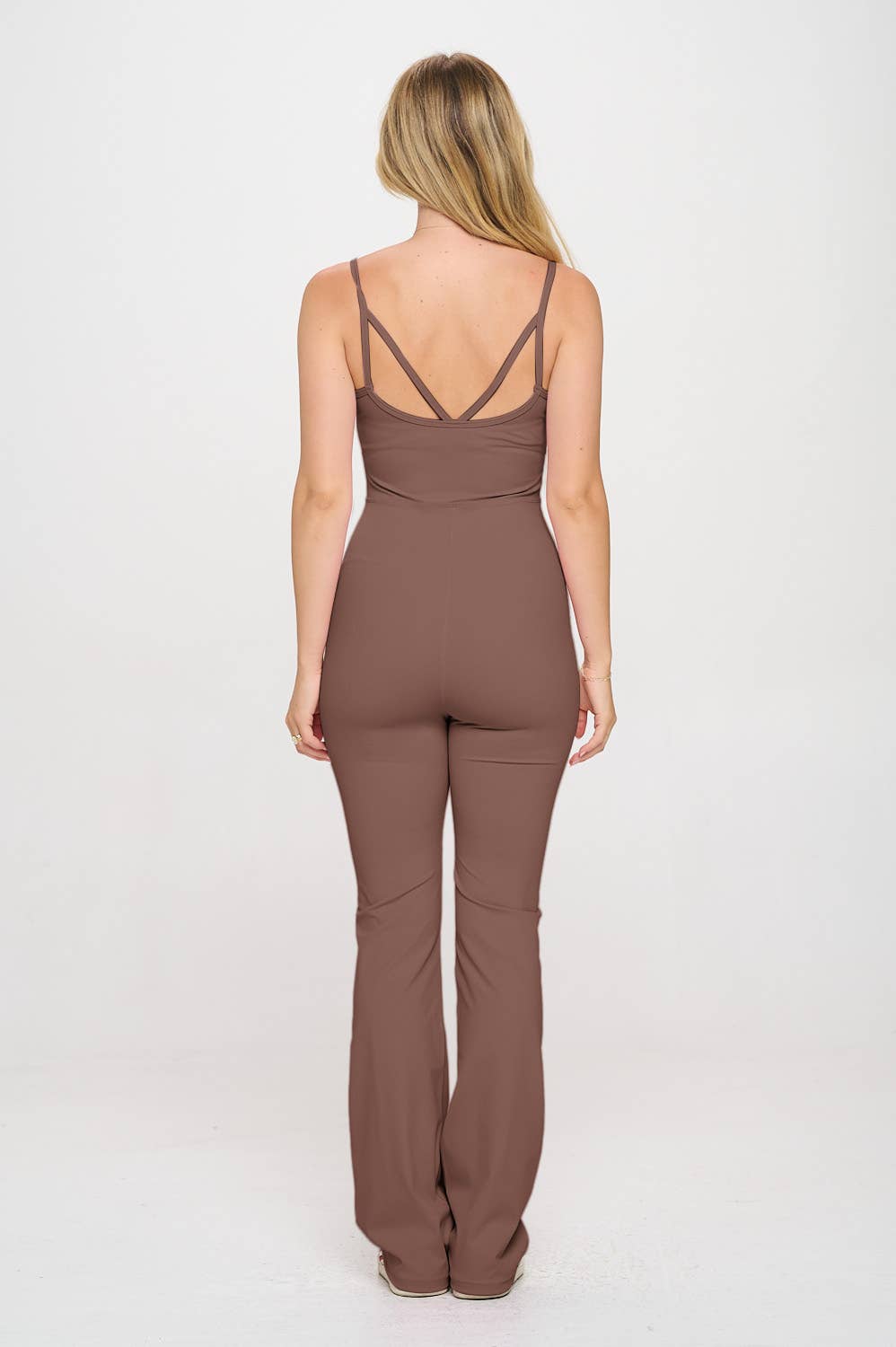 otos active – Engroshandel Activewear-sæt – til kvinder – 2 dele sæt med matchende flare-jumpsuit og aktiv jakke23