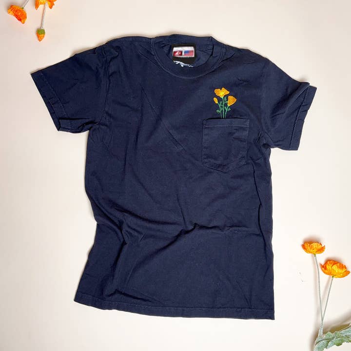 Made IN USA- Unisex Embroidered California Poppy Pocket Tee for wholesale by Animal Instincts