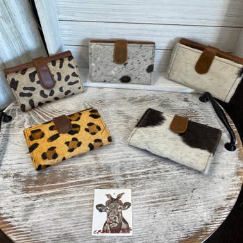 Purchase Wholesale cowhide purse. Free Returns & Net 60 Terms on Faire