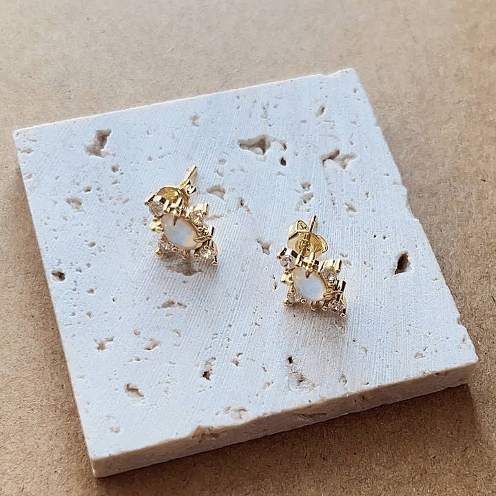 Opal Sunburst Stud Earrings in Gold and other Purchase Wholesale opal stud. Free Returns & Net 60 Terms on Faire trending on Faire.