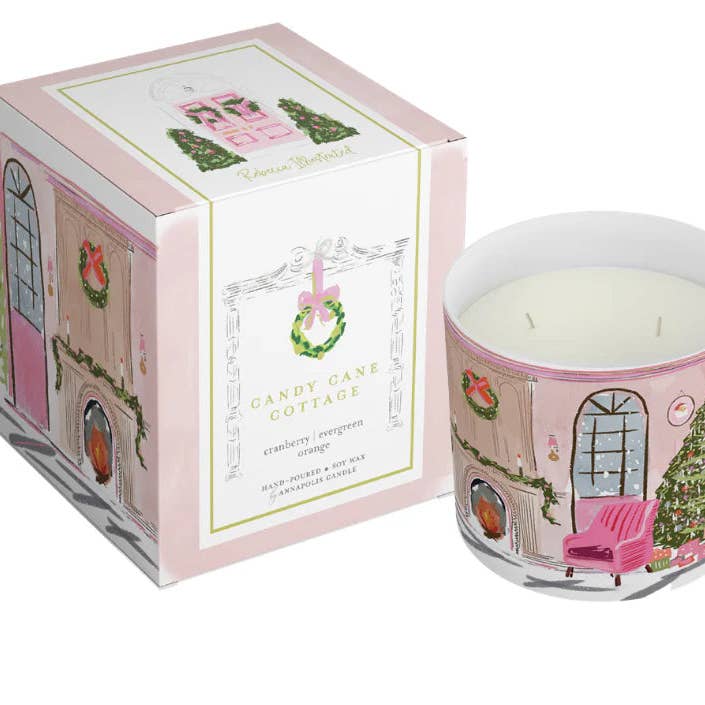 PINK CHRISTMAS FIREPLACE SCENIC CANDLE-CANDY CANE COTTAGE for wholesale by Rebecca Illustrated