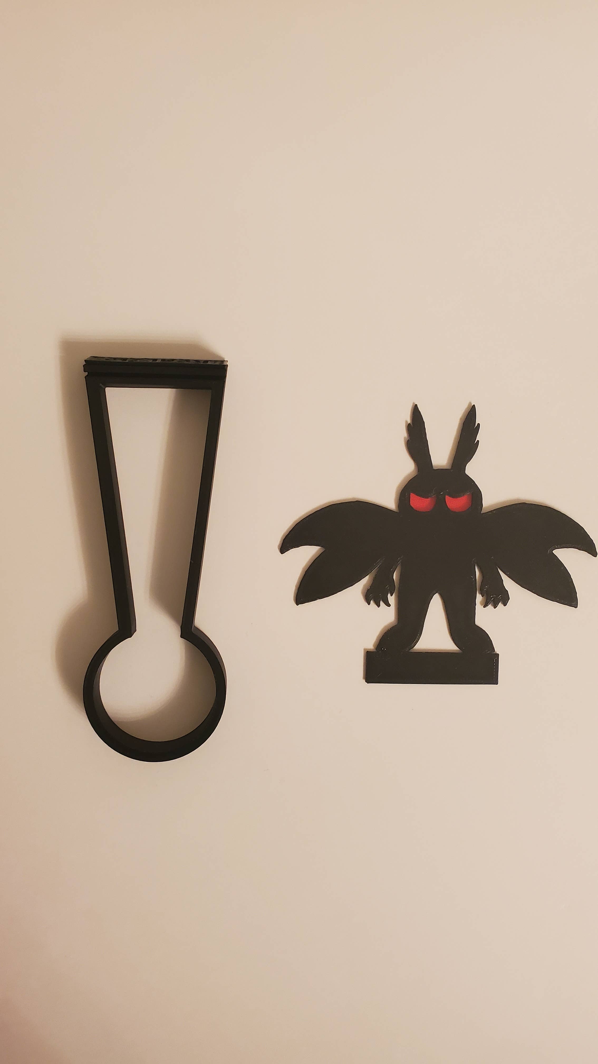 KeaLite - Wholesale Decorative Tabletop Object - KeaLite Red Eyed Mothman Shadow Caster and KeaLite Stand3