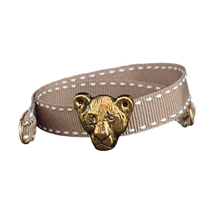 PULSEIRA BEGE LEÃO DOURADO por atacado de Smartever Srl