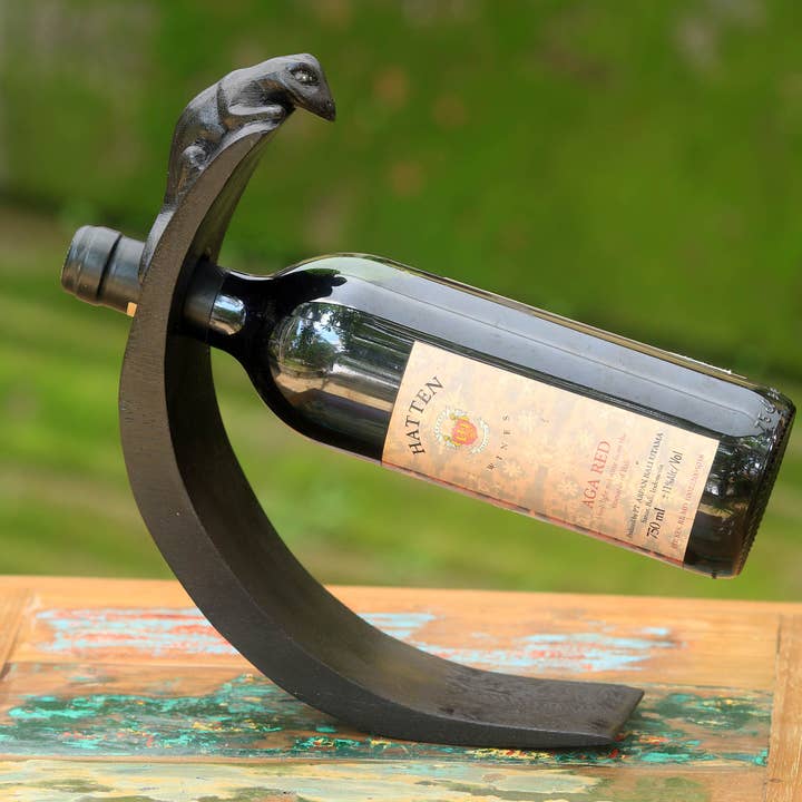 Novica Handmade Black Lizard Wood Bottle Holder for wholesale by NOVICA