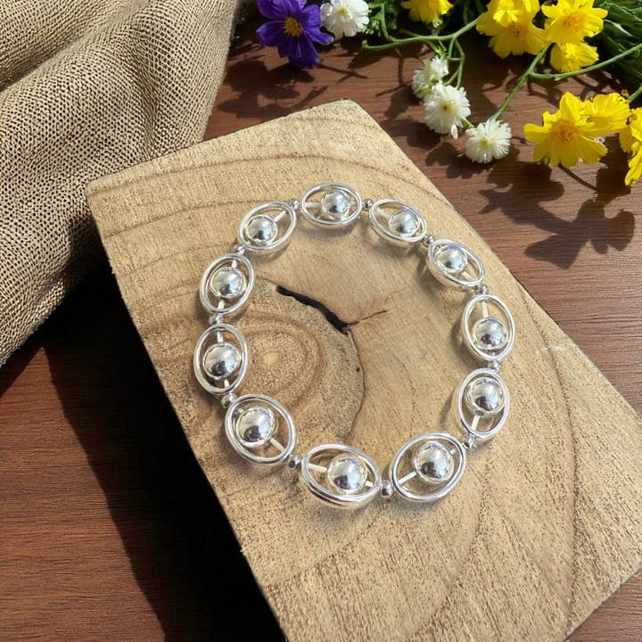 Silver Orbit Bead Stretch Bracelet BR242S for wholesale by Jess & Lou