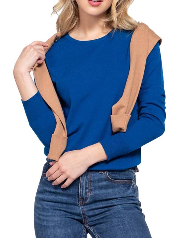 Pull basique à manches longues et col rond pour la vente par Vanilla Monkey