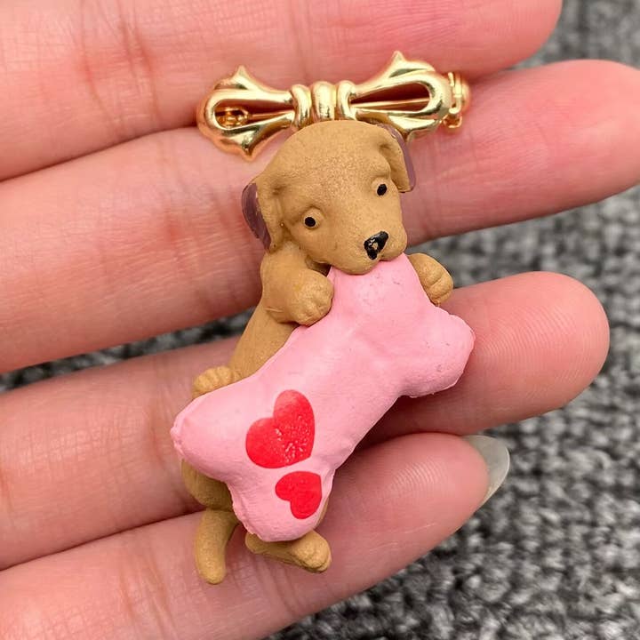 Puppy Gnawing Bone Resin Brooch for wholesale by Mio Queena