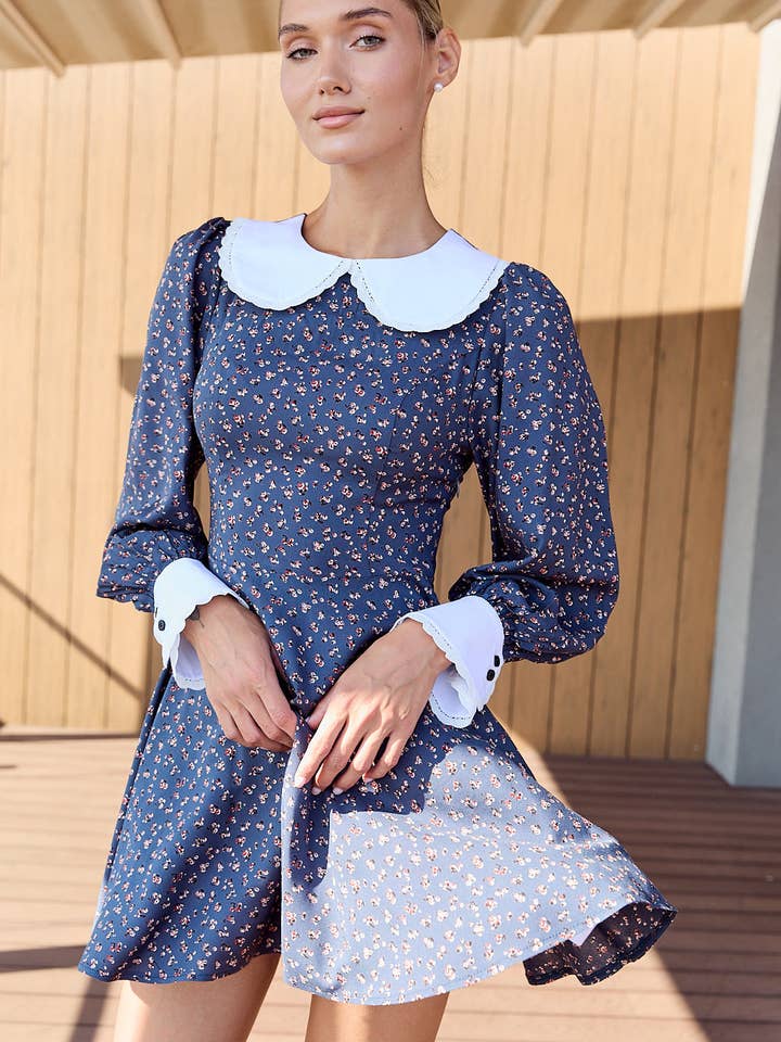 Vestido azul semi-ajustado com saia evasê e mangas bufantes com punhos por atacado de Azuri Fashion Group