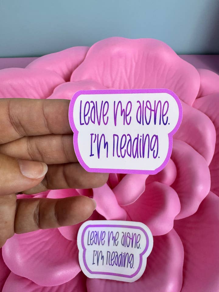 Funny Sticker For Readers and Book Lovers, Leave Me Alone I'm Reading, Matte Vinyl or Rainbow Holographic Die Cut Sticker for wholesale by Outfolded