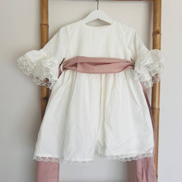 Abito Charlotte con pizzo per la vendita all'ingrosso da parte di Baby Popit