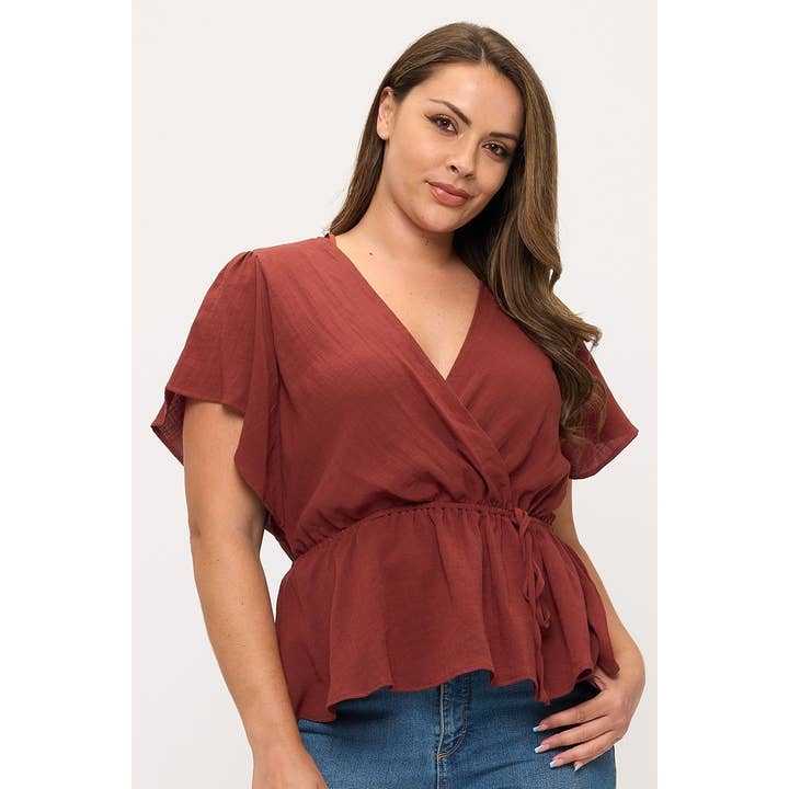 PLUS SIZE SURPLICE SHORT SLEEVE ELASTIC WAIST PEPLUM TOP for wholesale by Curve Market
