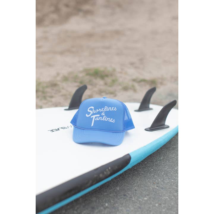 College Blue Shoreline Tan Line Summer Trucker Hat for wholesale on Faire