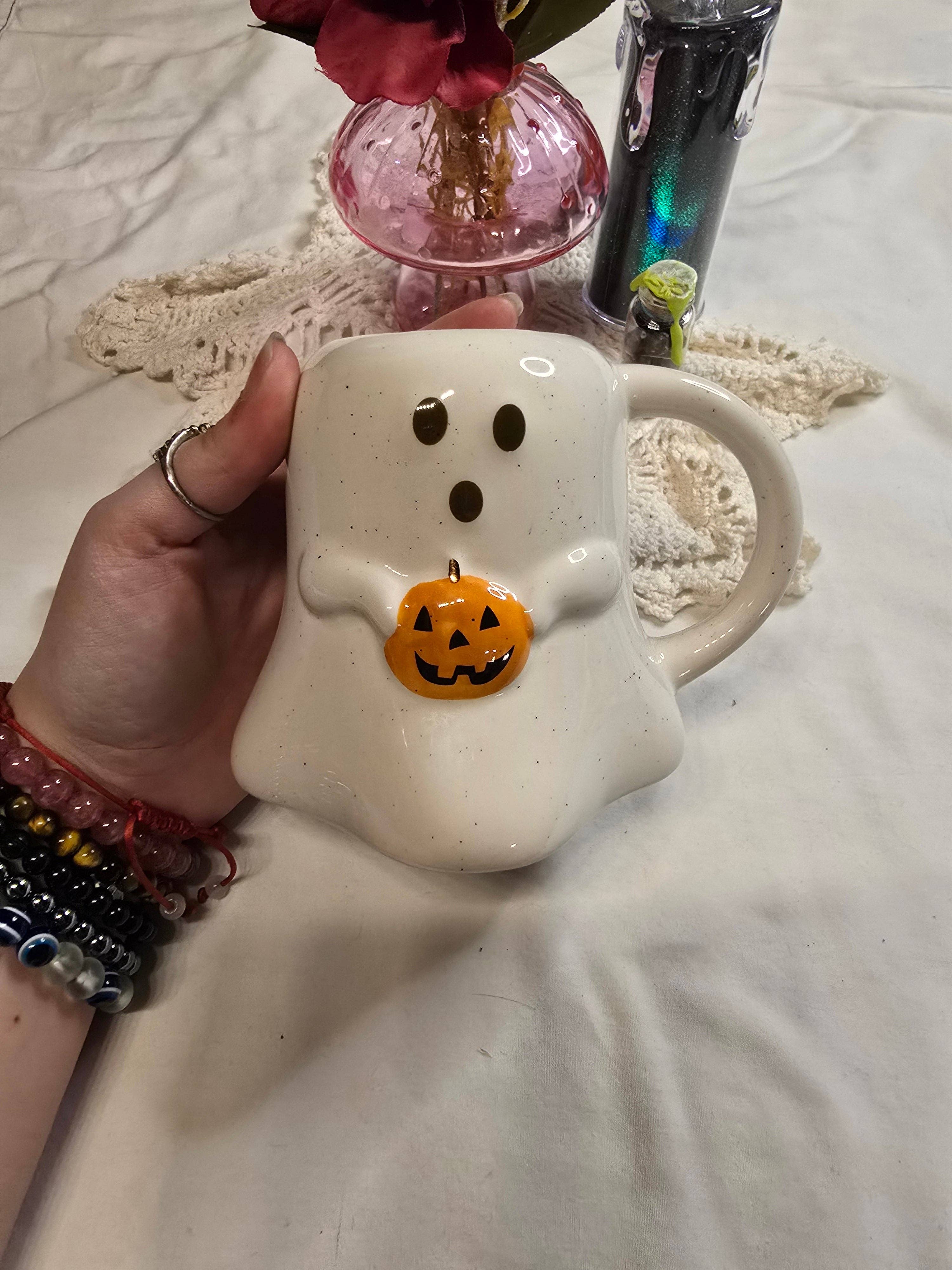 Chaotic Crystal Chick Co. - Wholesale Coffee Mug - Ghost Holding a Pumpkin Mug0