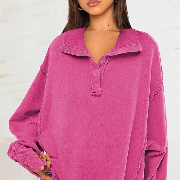 Langærmet løs knappet ensfarvet sweatshirt med split foran og revers krave. for engroshandel hos Ekartini