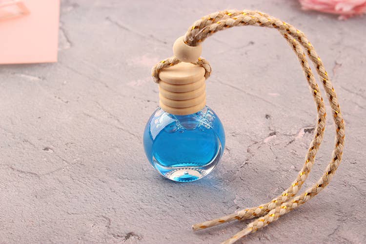 Candles Meta – wholesale Car Freshener - Unisex – Flat Circular Shape Car Air Freshener Diffuser Empty Bottle1