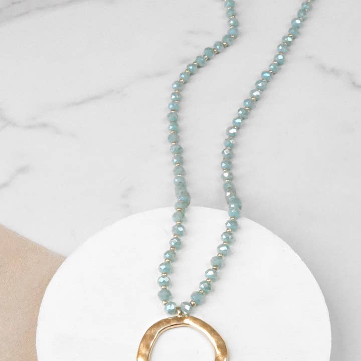 PennyLine inc - Wholesale Pendant/Charm Necklace - Beaded Necklace with Gold Tone Circle Pendant Aqua
