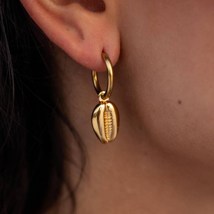 Puka Shell Huggies for wholesale by ALCO Jewelry