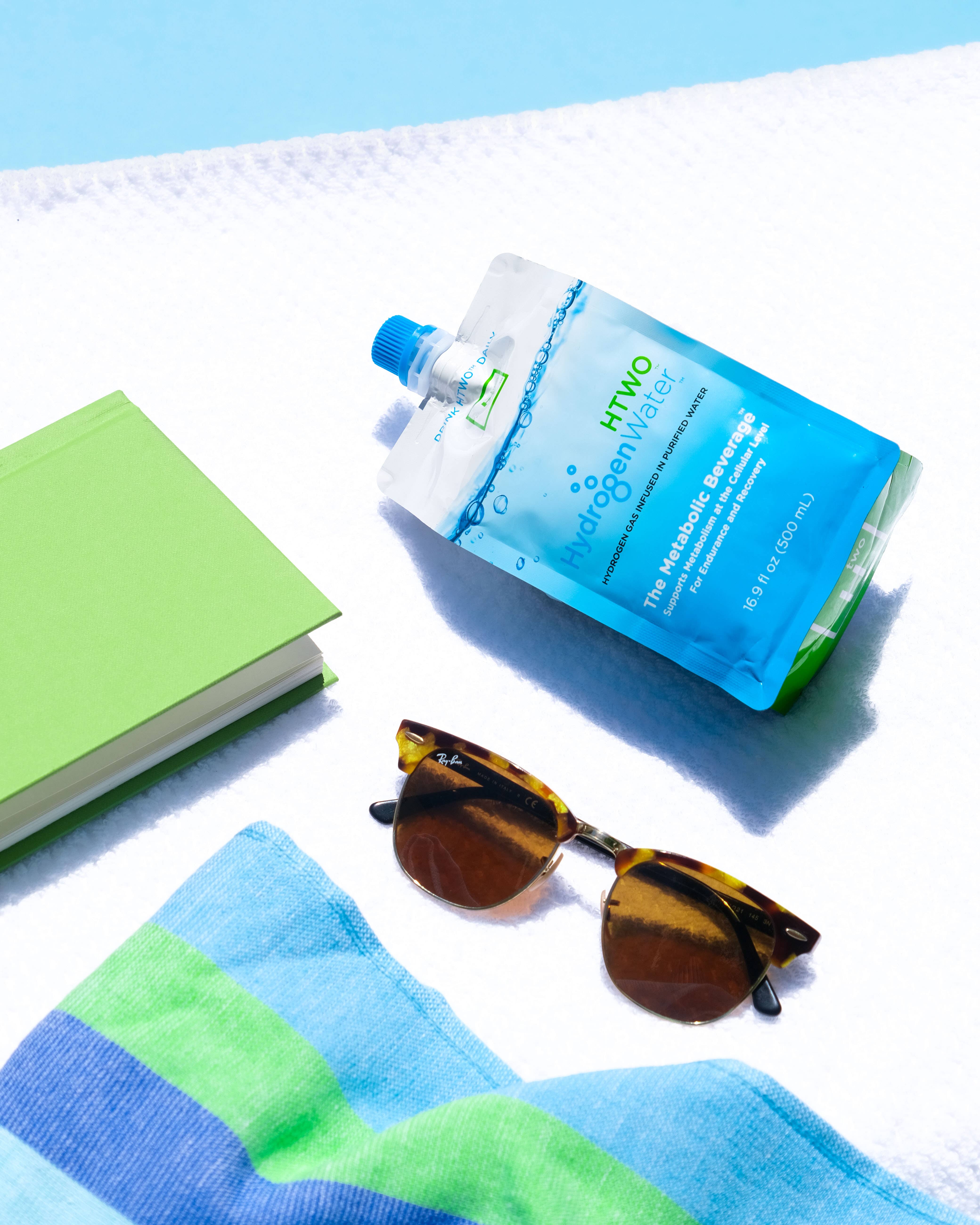 HTWO - Wholesale Bruiswater - HTWO ultra-puur water met waterstofinfusie, 24 pakjes6