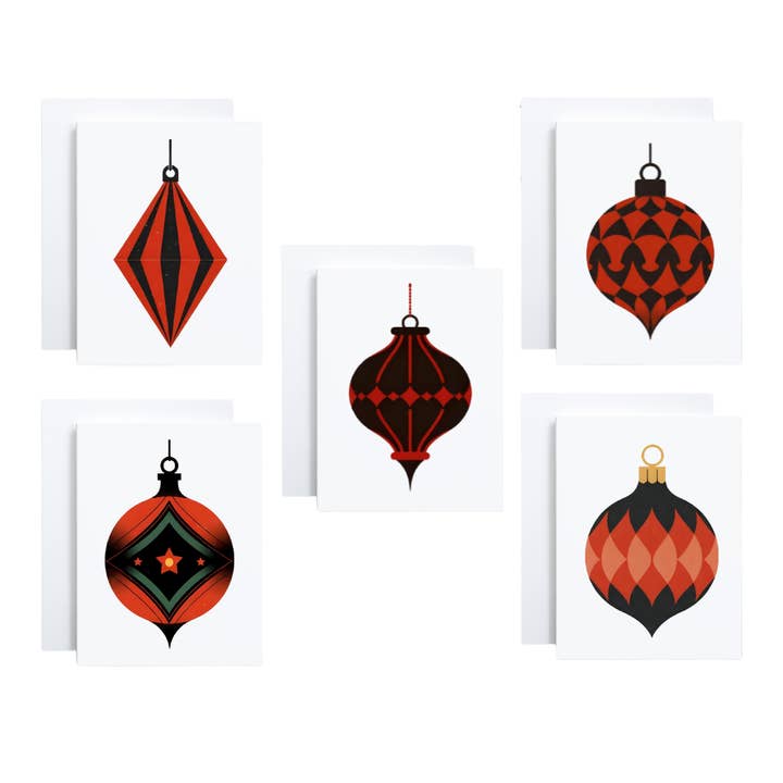 Æske med sorte og røde julepynt-notekort for engroshandel hos Cryptic Paper Co.