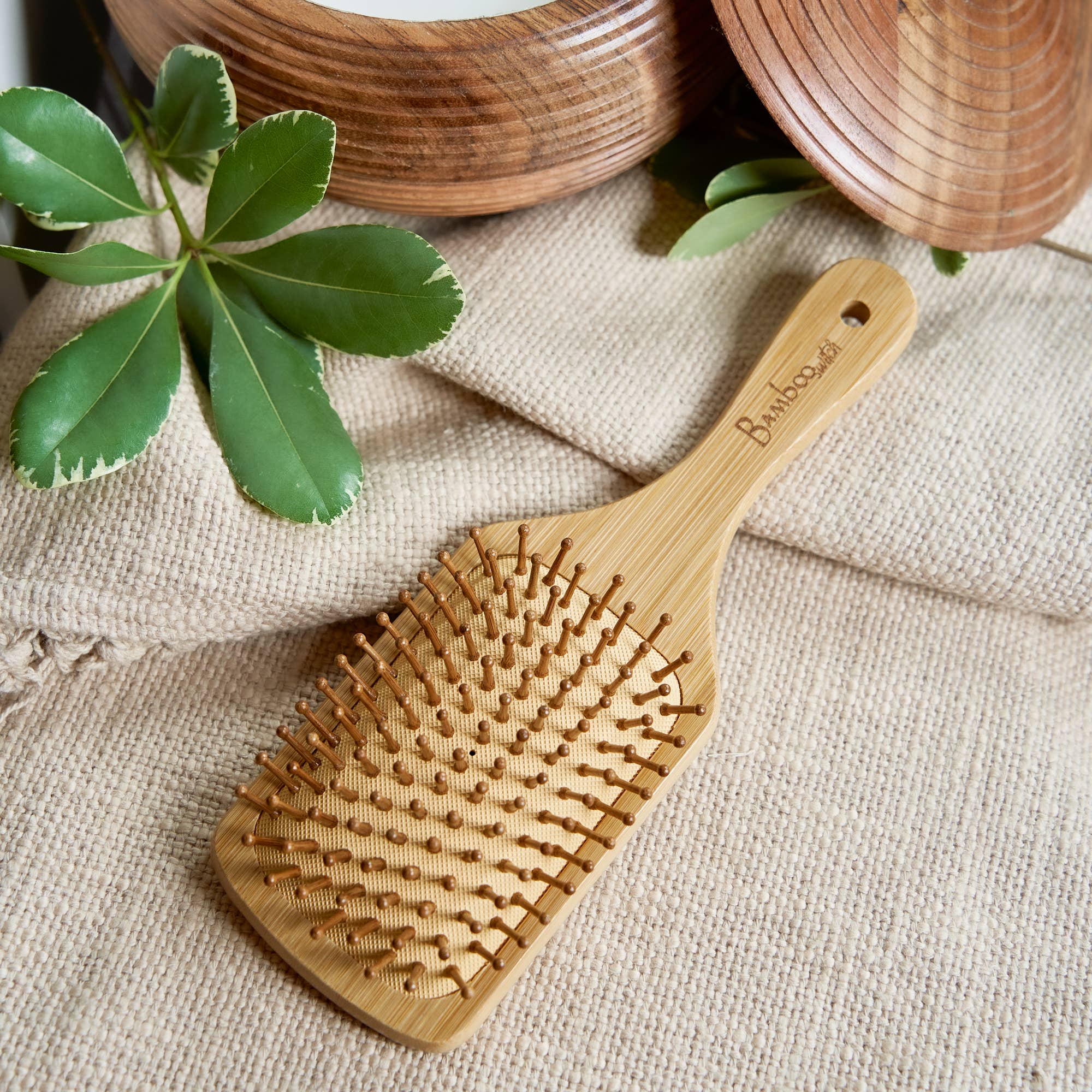 Bamboo Switch – wholesale Hair brush/comb – Bamboo Paddle Hairbrush - Square | Faire Market Bestseller7