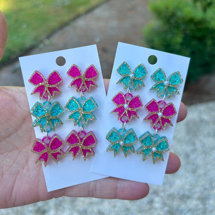 Triple Bow Dangles for wholesale by D and M’s Enterprise, LLC