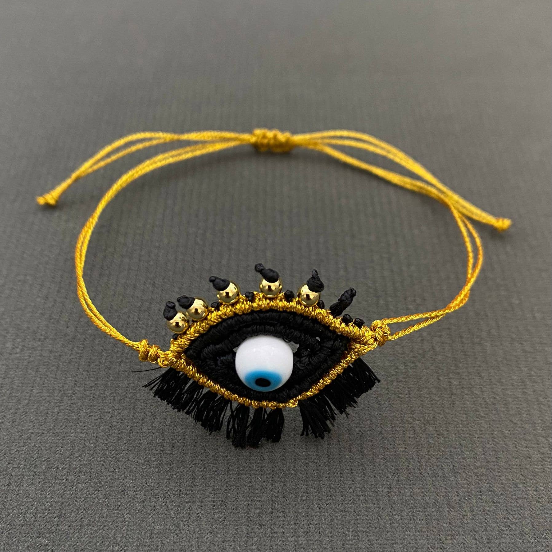 Mio Queena - Wholesale Charm/Dangle Bracelet - Woven with Polyester Thread Evil Eye Charm Bracelet1
