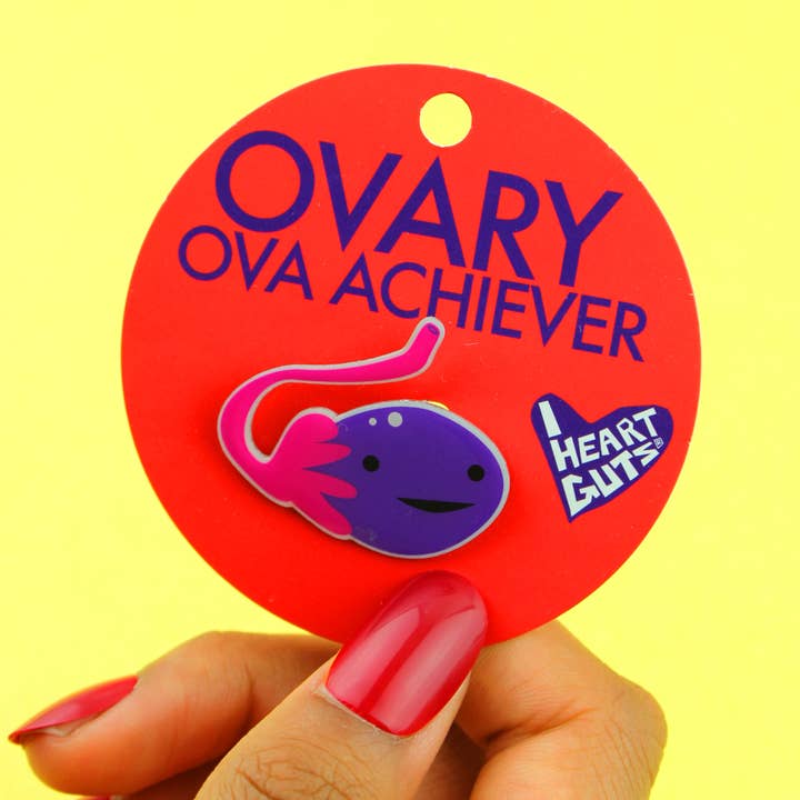 Ovary Lapel Pin - Ova Achiever for wholesale by I Heart Guts | Organ Plushies Wholesale