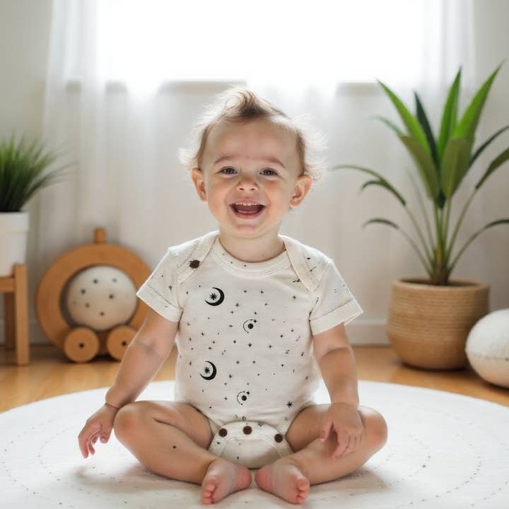 baby lap organic bodysuit | celestial star for wholesale by Finn + Emma
