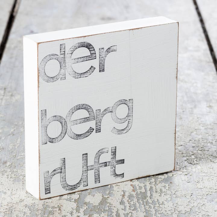 15x15cm Textplatte Wandbild "der berg ruft" für den Großhandel von IOPLA