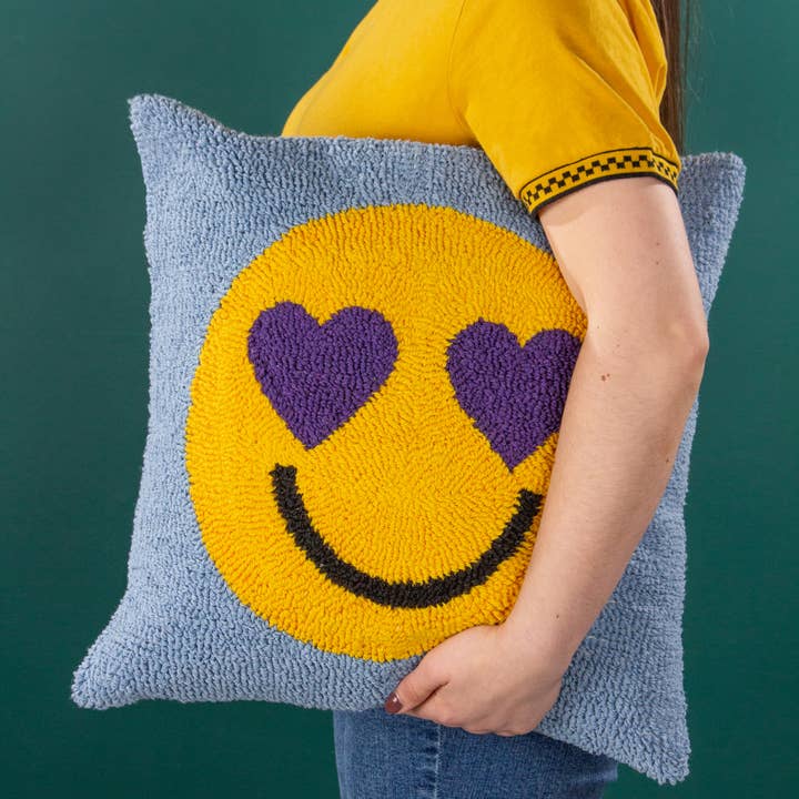 Smile Knitted Cushion Purple Power for wholesale by Riva Home