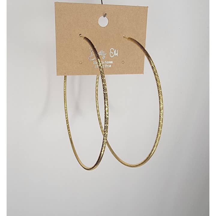 DIAMOND CUT HOOP EARRINGS. for wholesale by BETTYOH INC