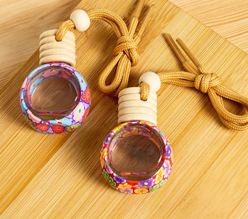 Random Artistic Floral Soft Clay Car Air Freshener Empty Bottle for wholesale on Faire4