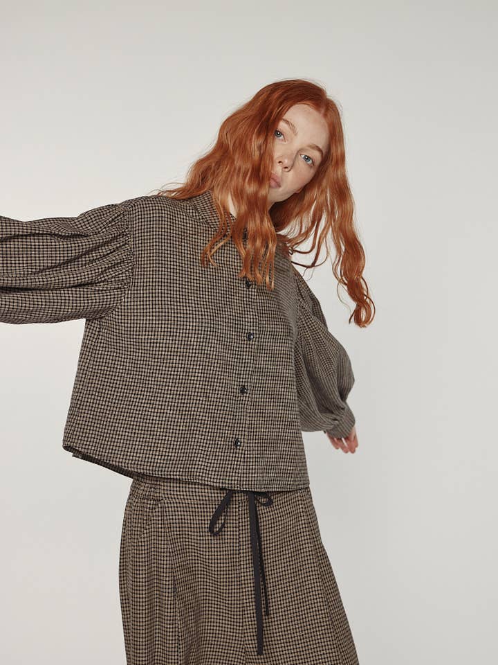 Blusa con maniche a volume per la vendita all'ingrosso da parte di amente